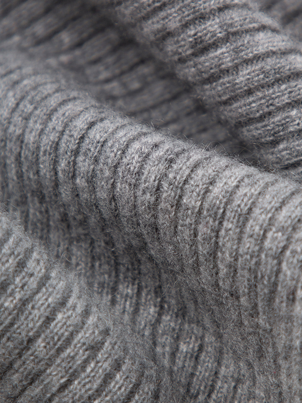 Dark gray cashmere sweater with a V-neck polo neck