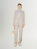 Light beige buttoned long sleeve blazer