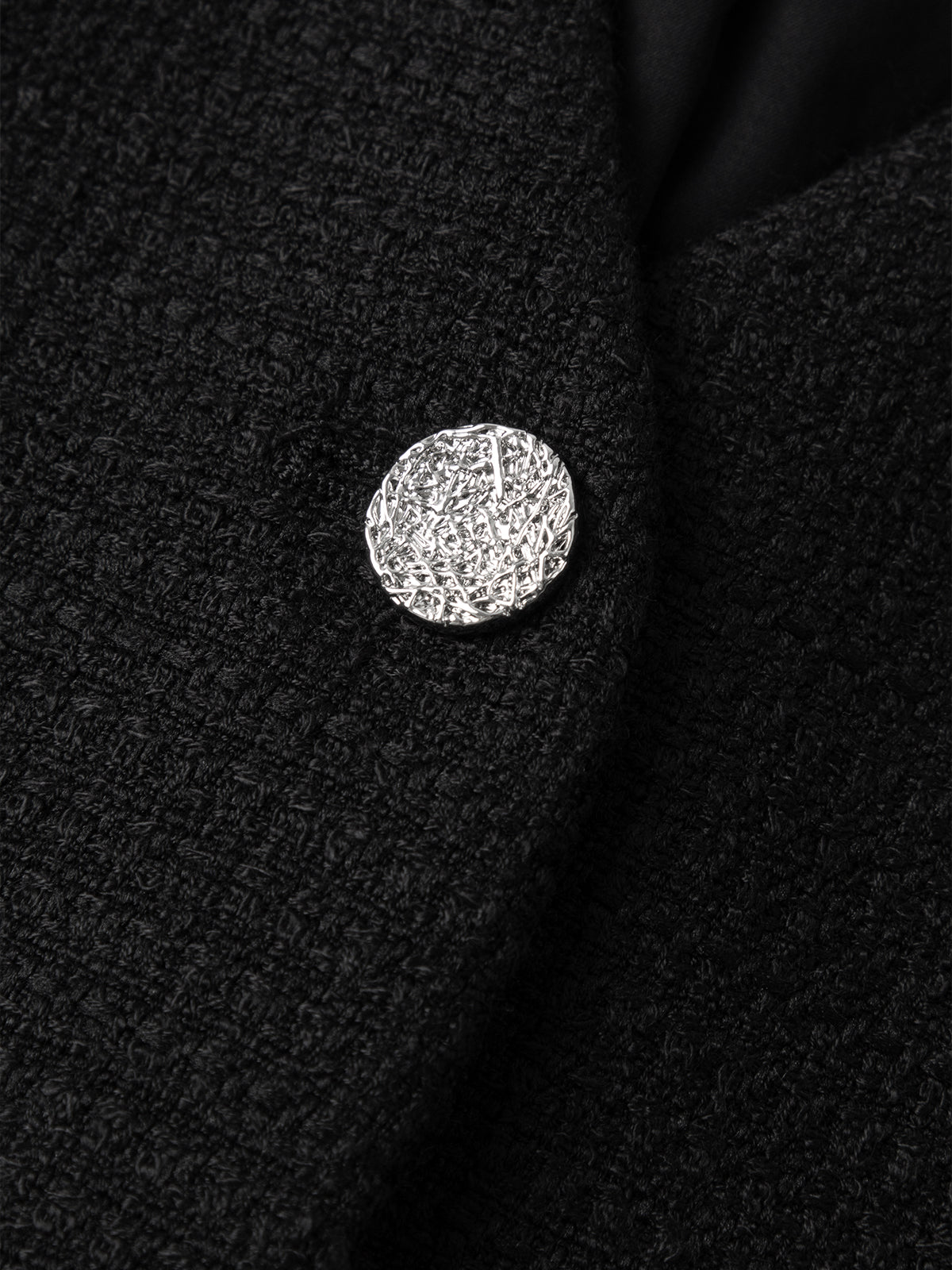 Veste courte en tweed noire