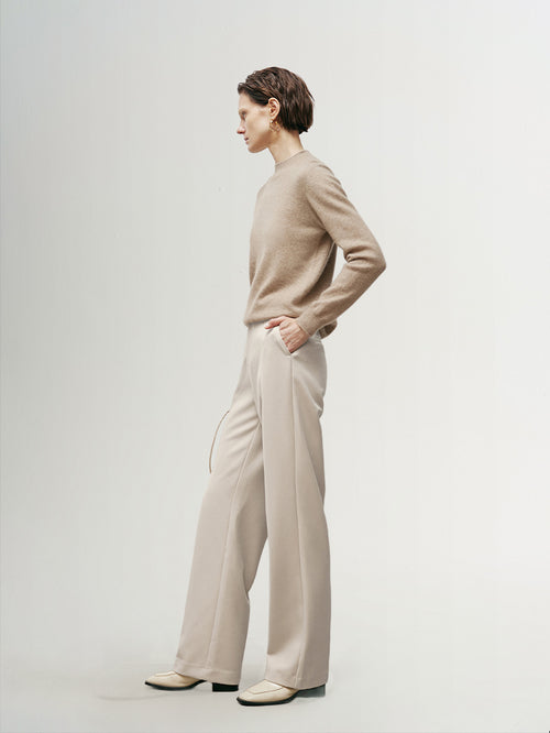 Load image 1 in gallery view. Light beige knitted winter pants