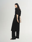 Black V-neck dress with puff sleeves
