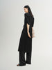 Black V-neck dress with puff sleeves