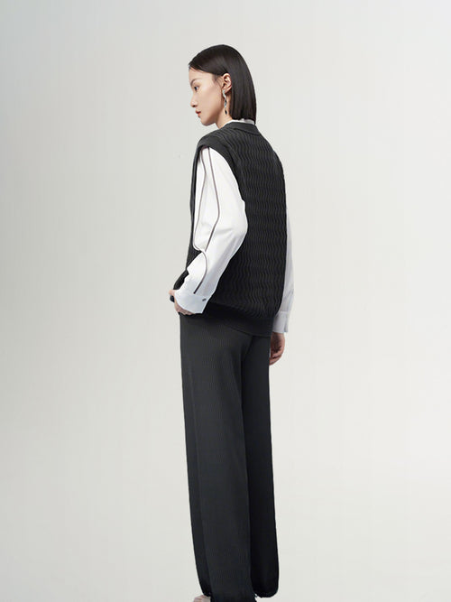 Load image 1 in gallery view. Dark gray V-neck knitted vest