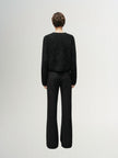 Black wool knit cardigan with round neck and buttons