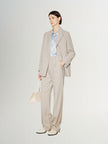 Light beige buttoned long sleeve blazer