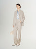 Light beige buttoned long sleeve blazer