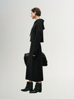 Black and shiny long knitted skirt