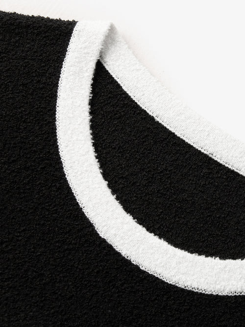 Load image 1 in gallery view. Black dress with contrast binding design