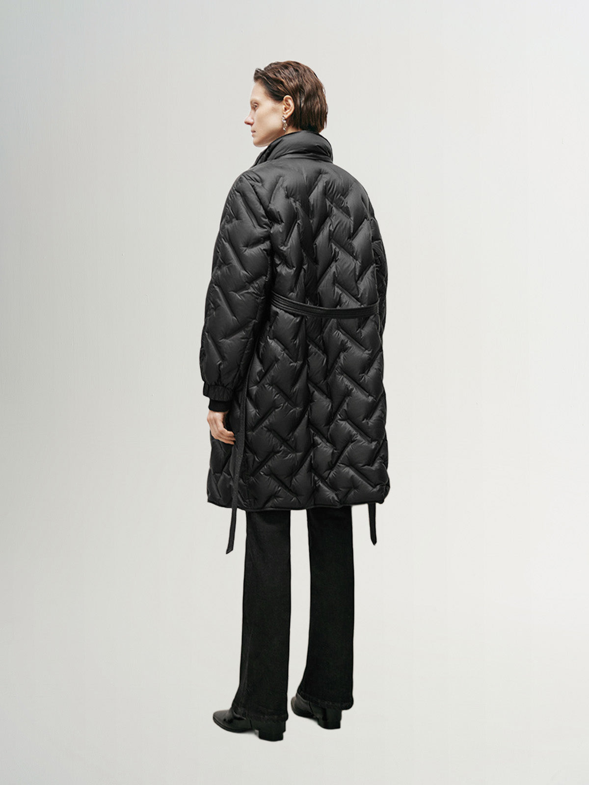 Black mid-length down jacket with hood and belt