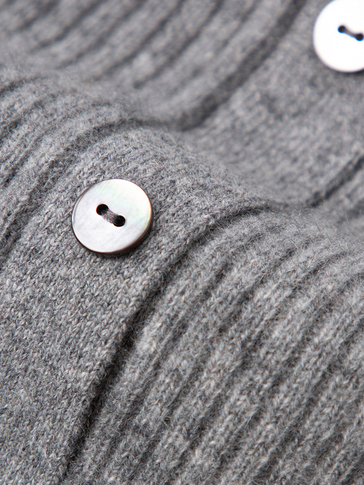 Dark gray cashmere sweater with a V-neck polo neck
