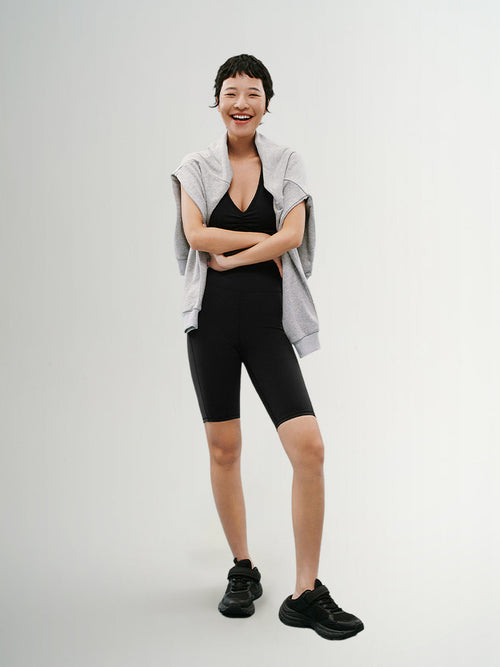 Load image 1 in gallery view. Black V-neck yoga bra
