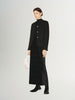 Black tweed jacket with round collar and button closure