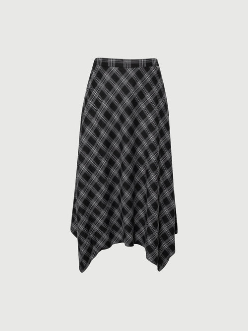 Load image 1 in gallery view. Plaid skirt on a light gray background