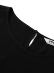 Black silk dress with puffed sleeves and boat neck