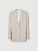 Light beige buttoned long sleeve blazer
