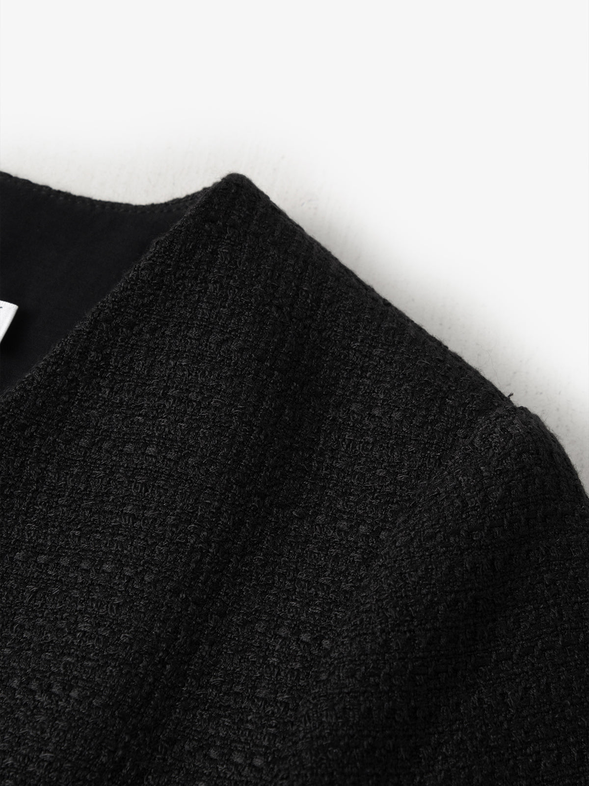 Veste courte en tweed noire