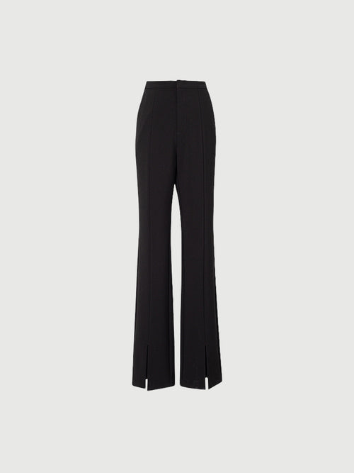 Load image 1 in gallery view. Black slim fit pants with a high waist and a slightly flared leg