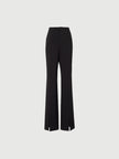 Black slim fit pants with a high waist and a slightly flared leg