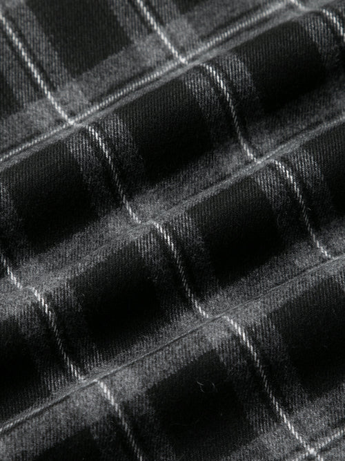 Load image 1 in gallery view. Close-up of a textured black surface with geometric patterns