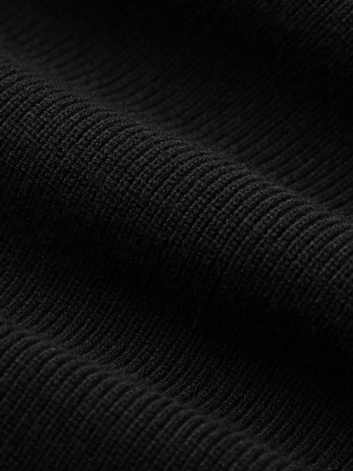 Load image 1 in gallery view. Close-up of black textured fabric
