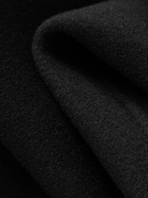 Charger l'image 1 dans la galerie. Manteau noir en laine à col droit, coupe droite et boutons