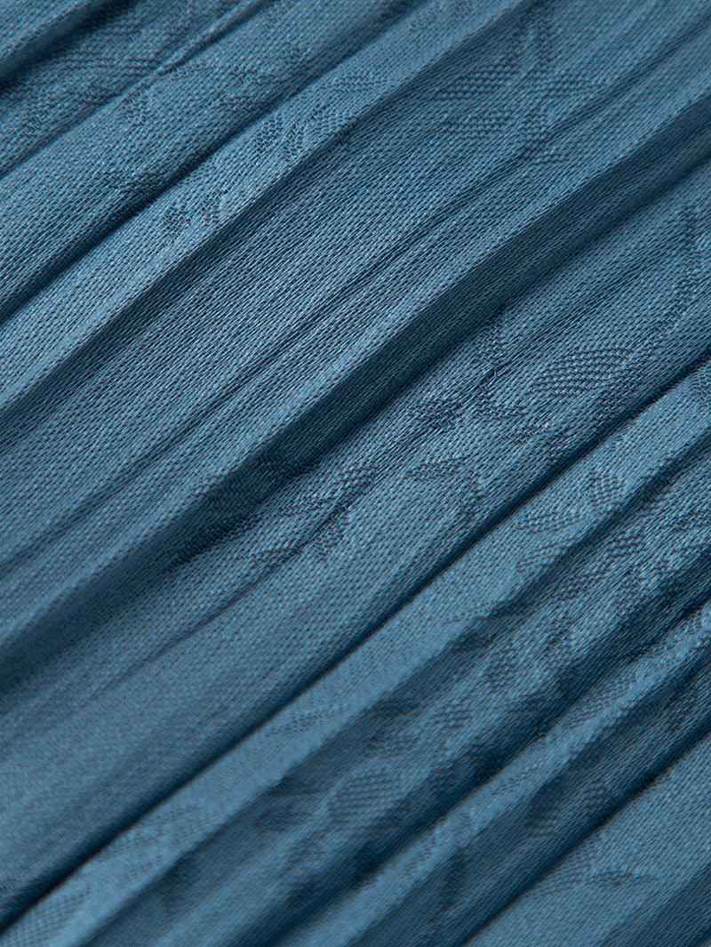 Pleated aqua blue dress