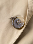 Beige short-sleeved trench coat