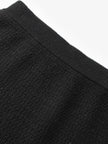 Black and shiny long knitted skirt