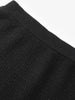 Black and shiny long knitted skirt
