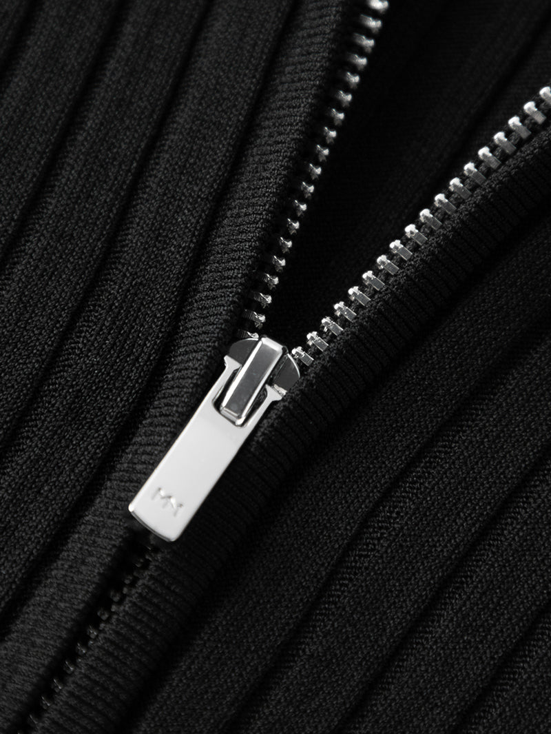 Top tricoté noir à col polo zippé, manches courtes