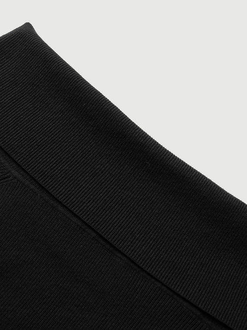 Load image 1 in gallery view. Close-up of a black fabric texture on a light gray background