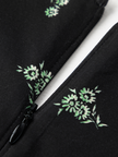 Black cotton mid-length dress with floral patterns