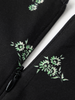 Black cotton mid-length dress with floral patterns