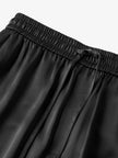 Black satin style pants