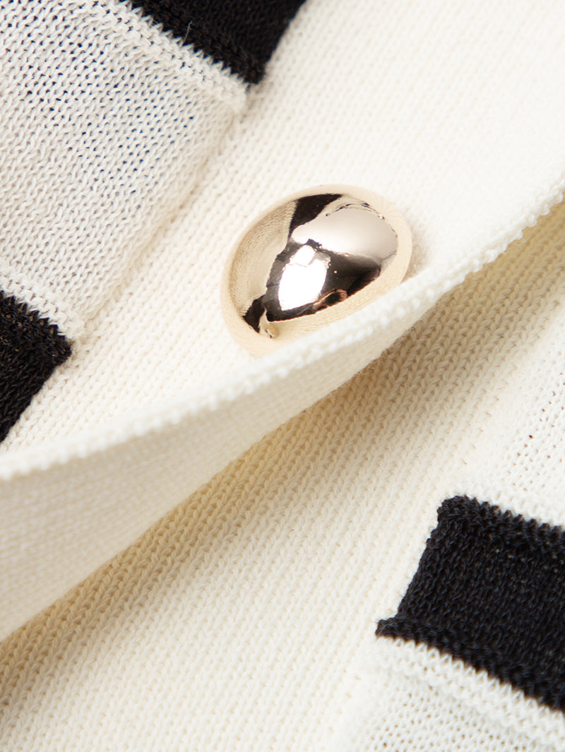 Top en tricot beige et noir à rayures