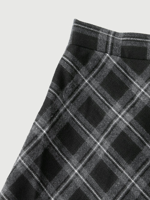 Load image 1 in gallery view. Close-up of a black and gray plaid pattern on a plain background