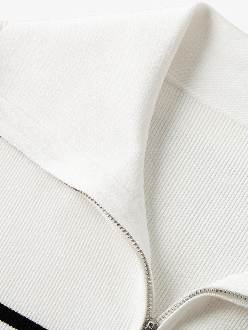 Veste en tricot à rayures blanches et noires à manches longues et fermeture éclair