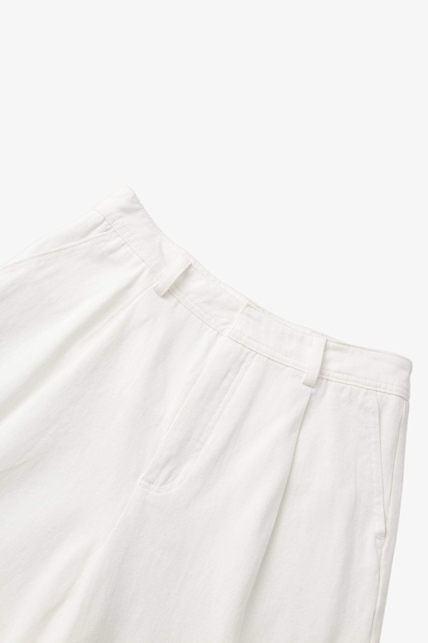 Cream wide leg pants with black belt
